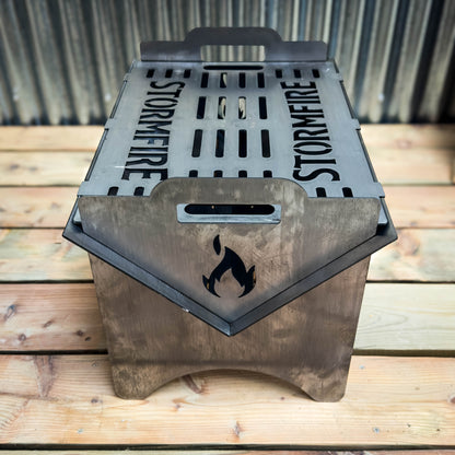 Storm Fire Portable Flat-Pack Fire Pit & Grill: Handmade Steel Camping Cookout